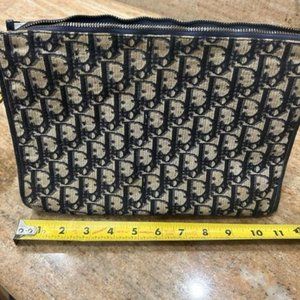 Christian Dior zip clutch bag